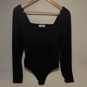 ARITZIA BABATON black long sleeve bodysuit size L **never worn